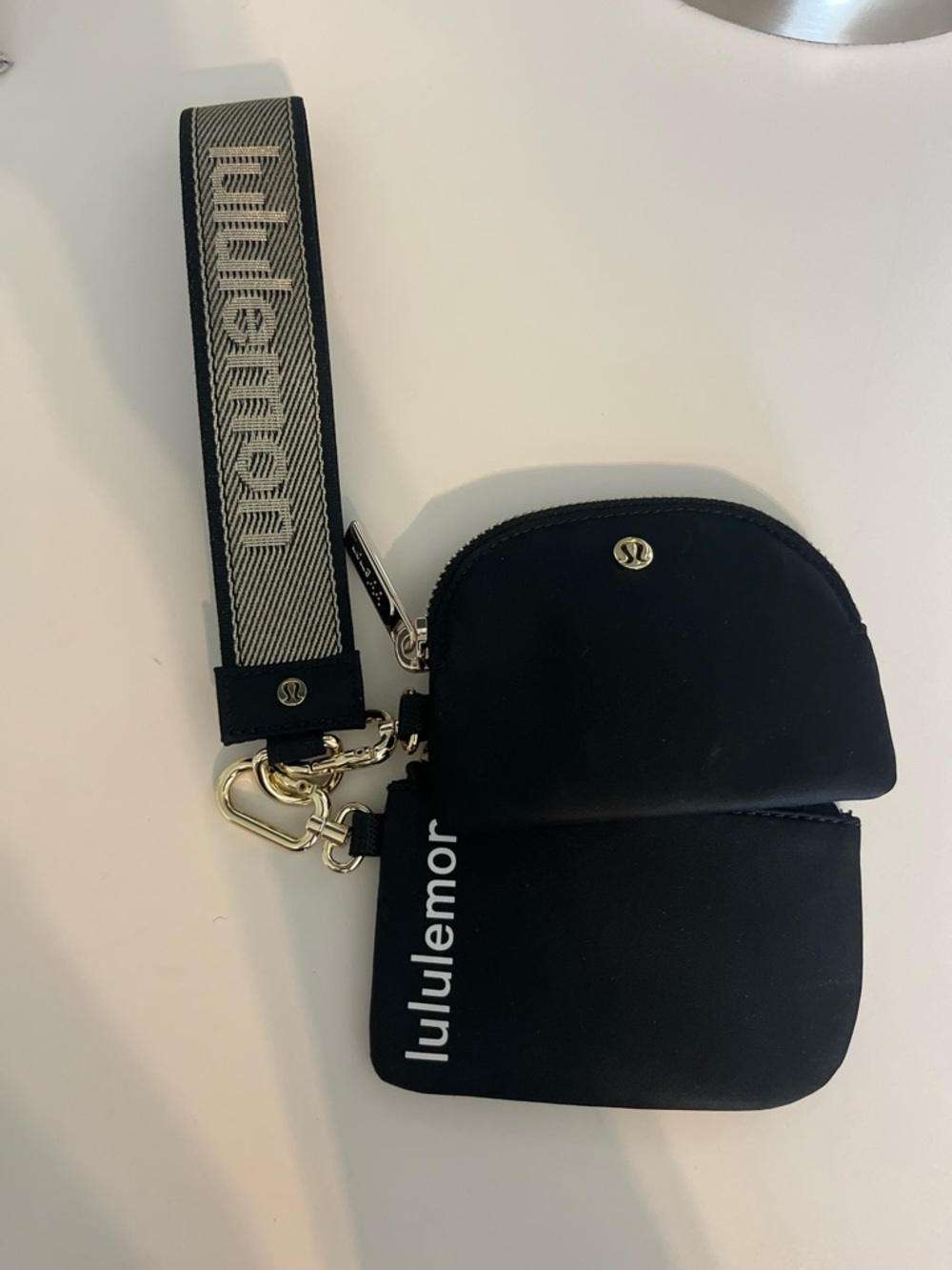 Lululemon Black and Gold Dual Pouch Wristlet with Branded Strap